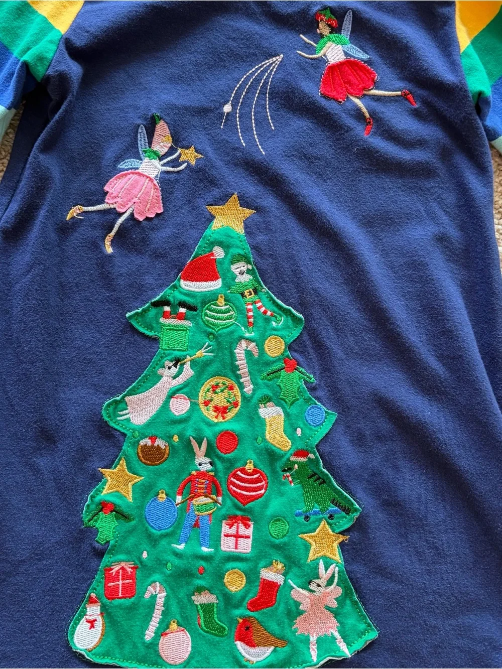 Girls Navy Christmas Tree Dress with Rainbow Striped Sleeves
